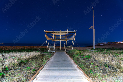 Port Hedland coastline near Cemetery Beach Park at night, WA, Australia photo