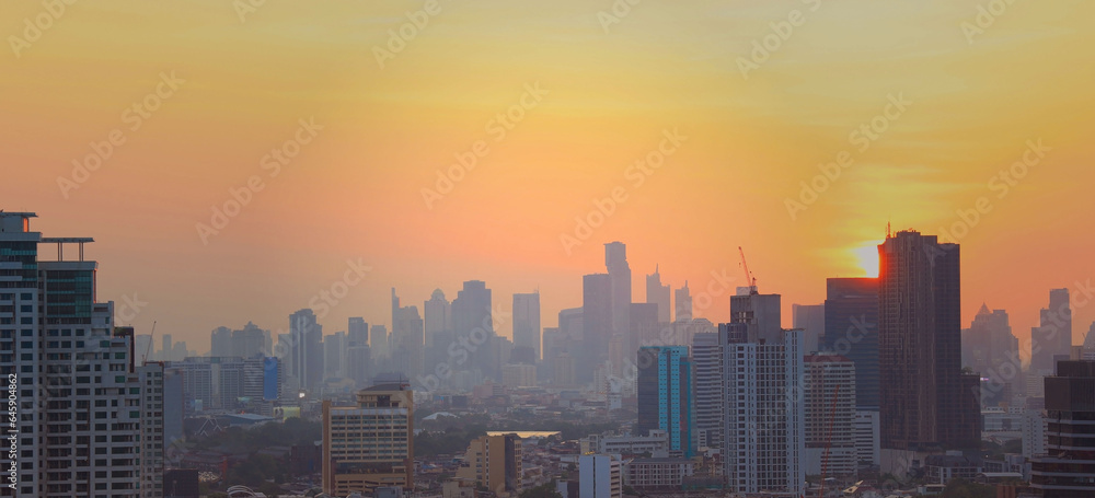 The sunset sky scene in a cityscape town ,Bangkok ,Thailand.