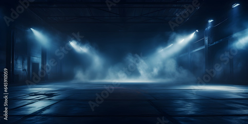 A dark empty street with a dark blue background spotlights, smoke floating up the interior texture, night view