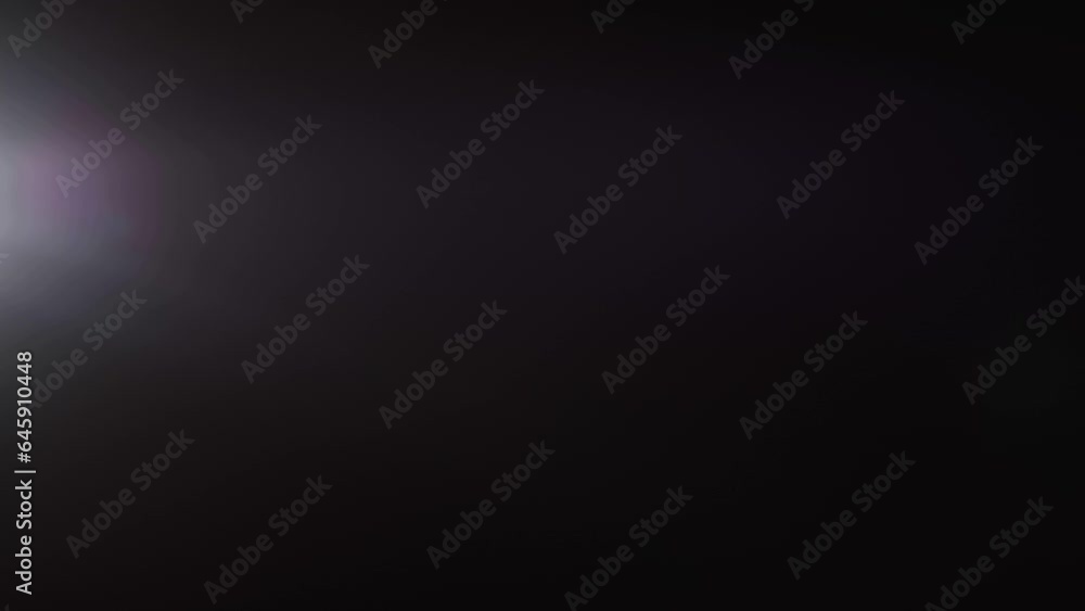 lens flare effects on black background.4k lens flare effects on black background.4k