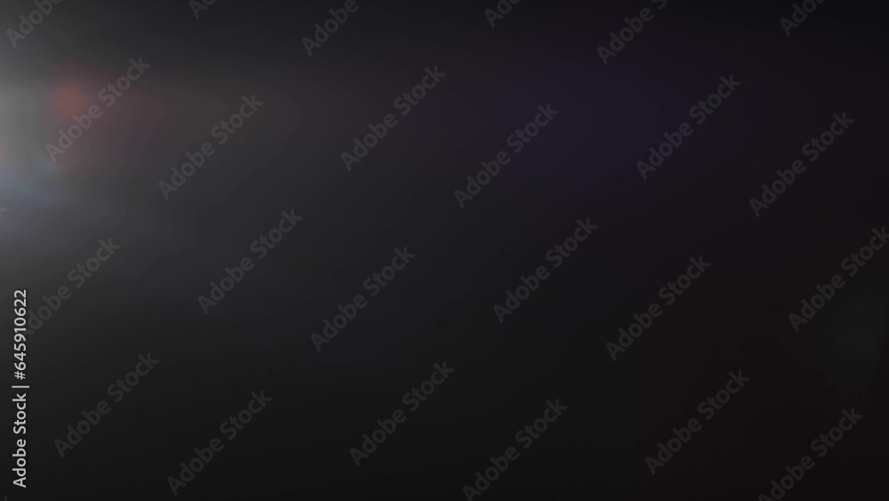 lens flare effects on black background.4k lens flare effects on black background.4k