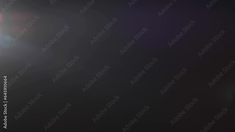 lens flare effects on black background.4k lens flare effects on black background.4k