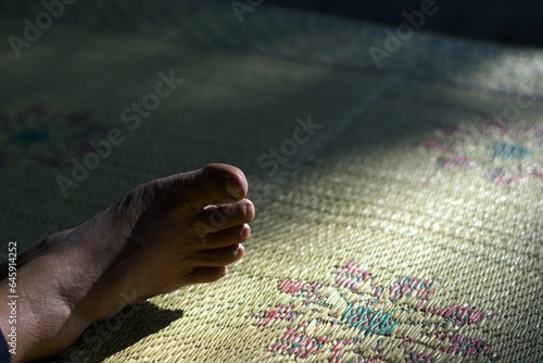 human foot and toe on a mat