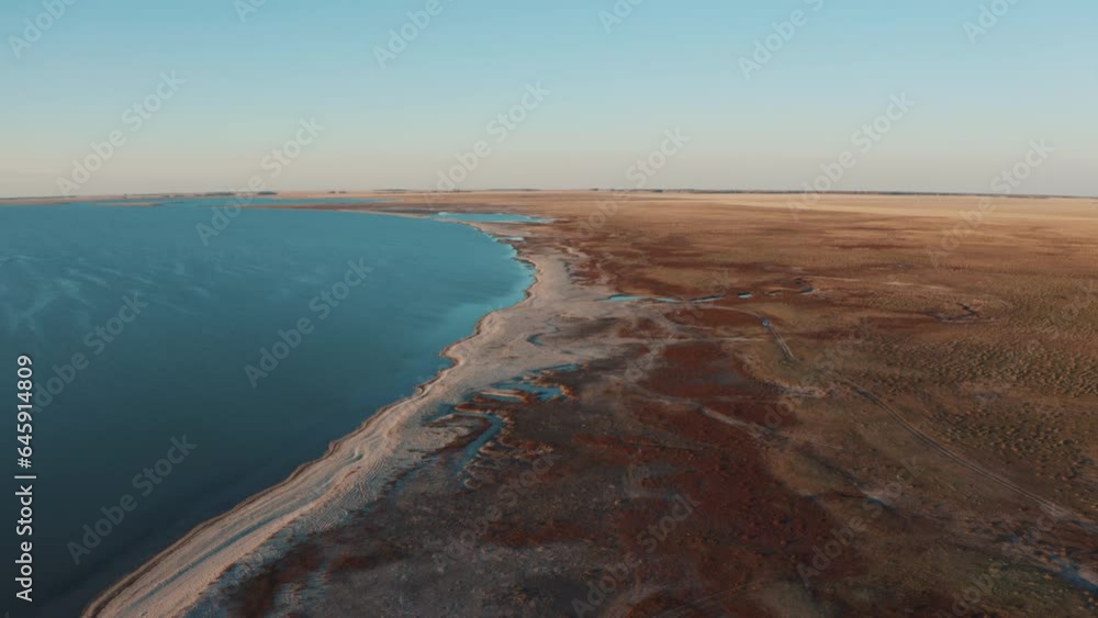 This stock video shows a lake in a desert area. This video will decorate your projects related to nature, lakes, reservoirs, beautiful landscapes. This stock video shows a lake in a desert area. This video will decorate your projects related to nature, lakes, reservoirs, beautiful landscapes.