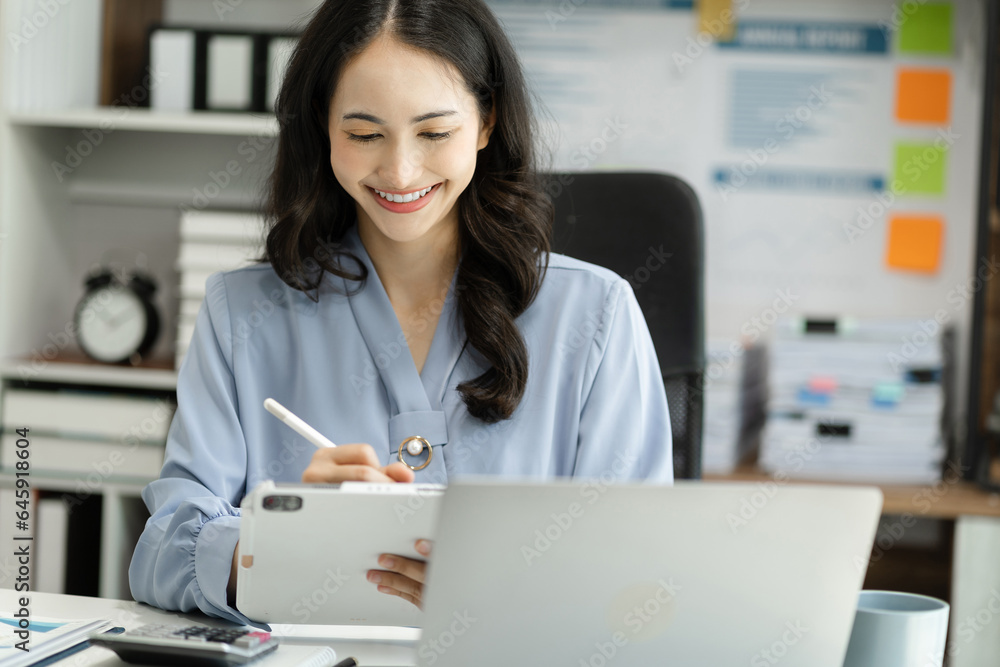 Learning online working concept. Businesswoman working on tablet and laptop computer, searching working in office. Learning online working concept. Businesswoman working on tablet and laptop computer, searching working in office.