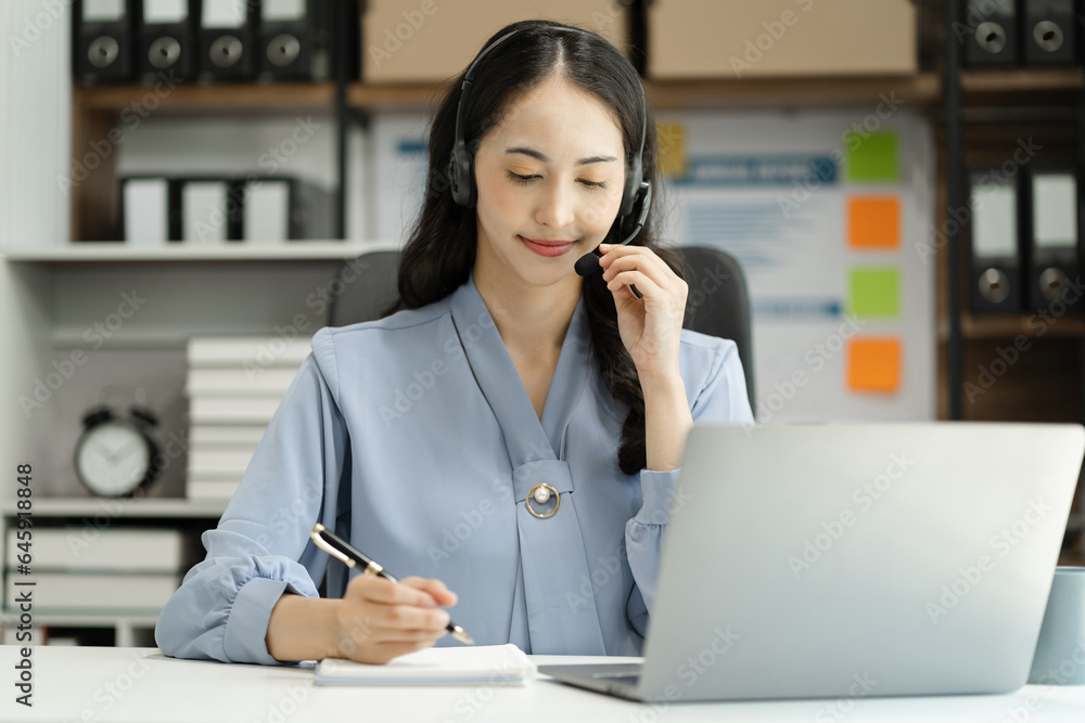 Serious call center operator in wireless headset talking to customer, woman in headphones with microphone consulting customer on phone in customer support service, looking at computer screen. Serious call center operator in wireless headset talking to customer, woman in headphones with microphone consulting customer on phone in customer support service, looking at computer screen.