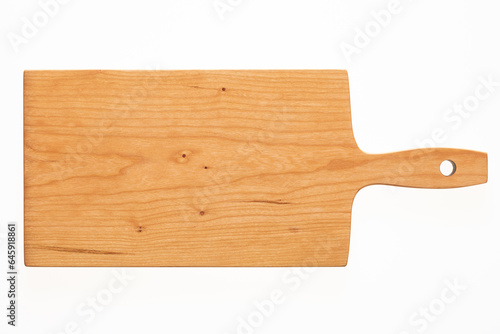 Handmade cherry wood cutting board. Cutting board isolated on white background.