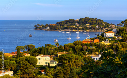 Panoramic view of Saint-Jean-Cap-Ferrat resort town on Cap Ferrat cape with exclusive estates at French Riviera of Mediterranean Sea in France photo
