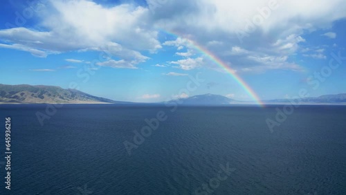 Aerial video of a rainbow over the Sayram Lake in Xinjiang, China photo