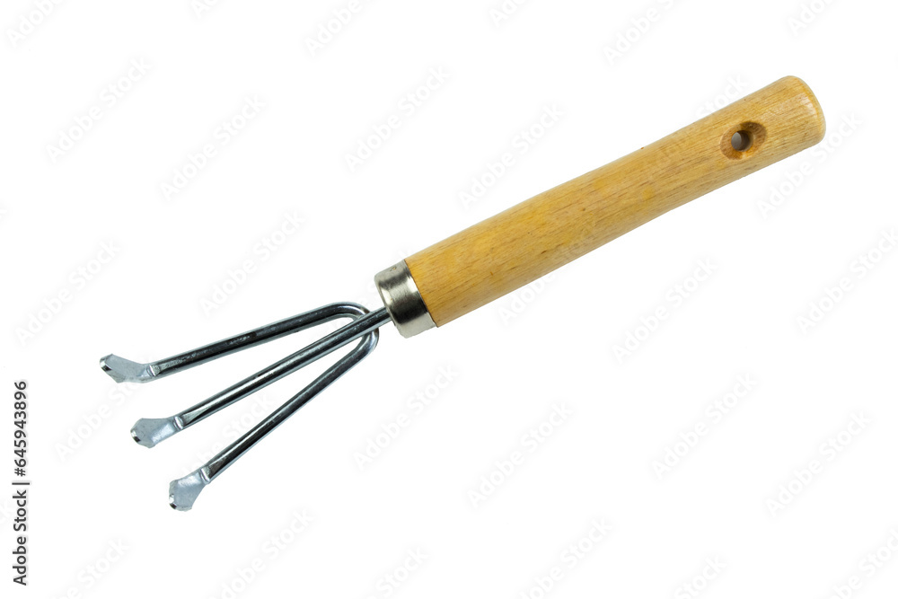 small garden rake isolated on a white background. Tool. Top view. small garden rake isolated on a white background. Tool. Top view.