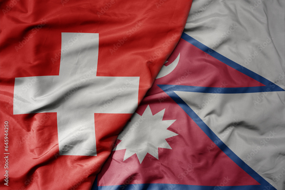 big waving national colorful flag of switzerland and national flag of nepal . big waving national colorful flag of switzerland and national flag of nepal .