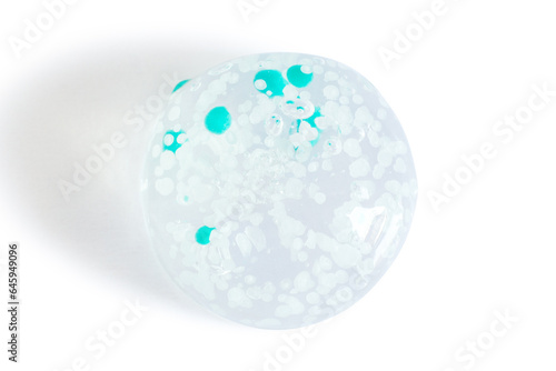 smears and drops of transparent gel with blue granules. On a white background.