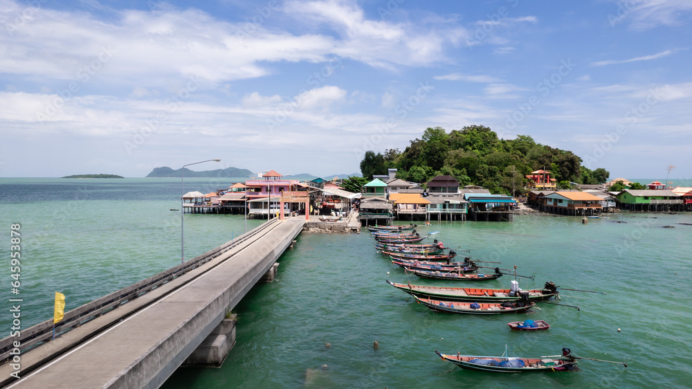 Beautiful small island in tropical sea with small bridge to the island located koh rat suratthani Thailand