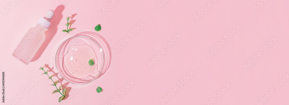 Cosmetic jar with a white cap and a pipette on a pink background. Petri dish with gel on a pink background. Surrounded by plants. Cosmetic jar with a white cap and a pipette on a pink background. Petri dish with gel on a pink background. Surrounded by plants.