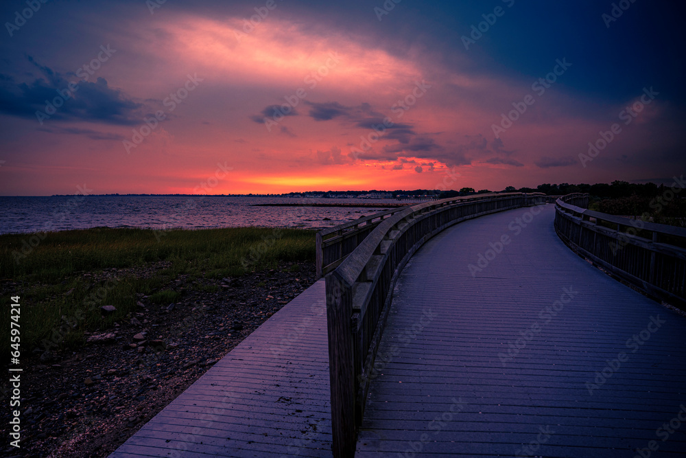 Milford Connecticut Sunset Seascape along the curving boardwalk at Silver Sands State Park, Charles Island view on Long Island Sound Beach