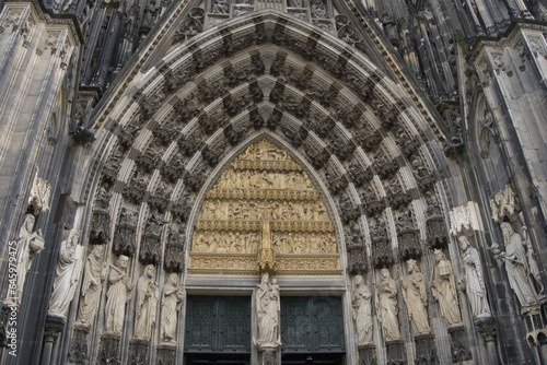 Main portal of Cologne Cathedral with statue of Mary in the centre