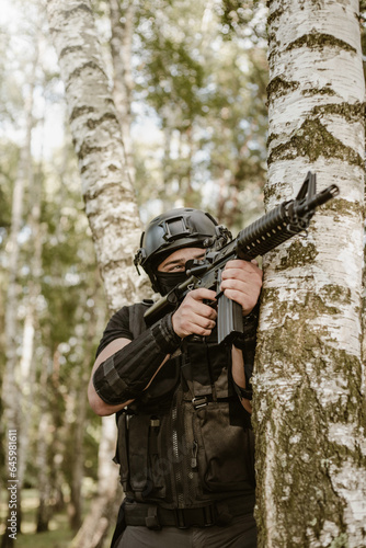 Soldier aiming to the target, and ready to shoot.