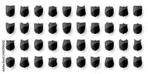 Set of various vintage 3d shield icons. Black heraldic shields. Protection and security symbol, label. Vector illustration