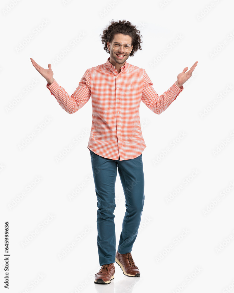 full body picture of handsome happy guy with glasses opening arms full body picture of handsome happy guy with glasses opening arms
