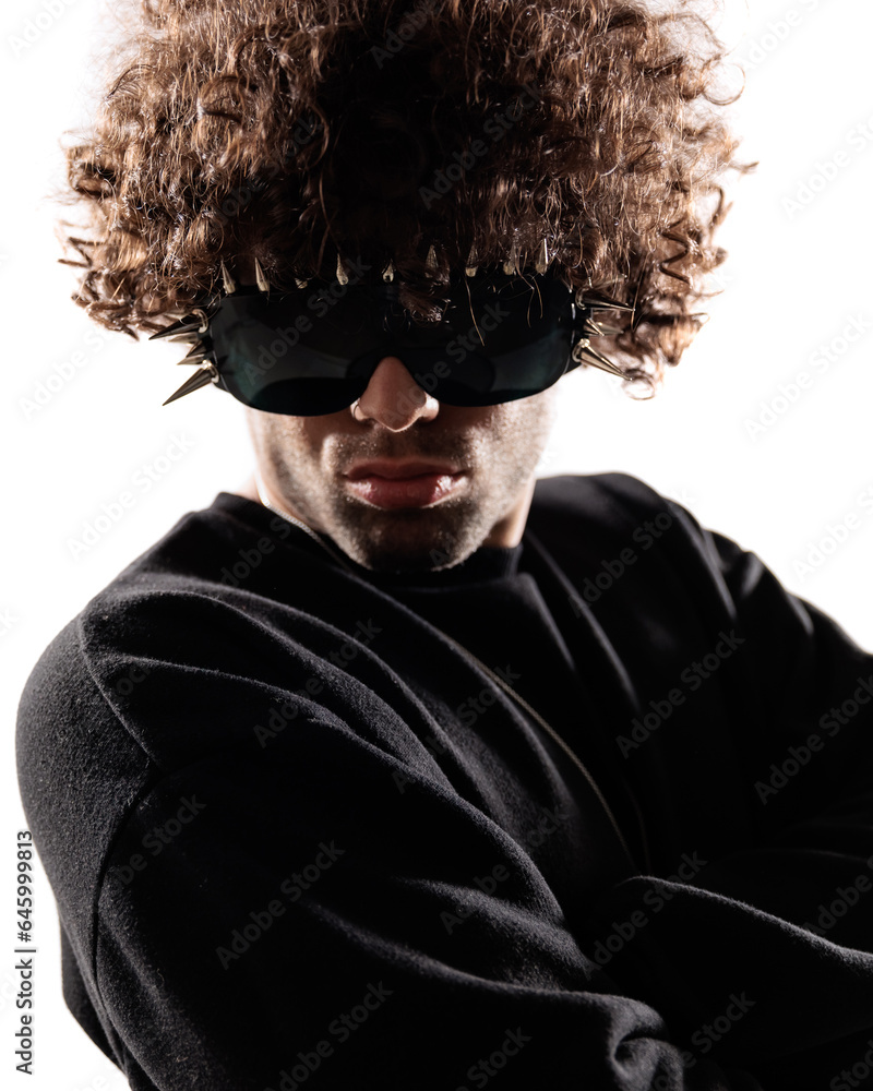 side view of cool fashion model with glasses in black sweatshirt posing side view of cool fashion model with glasses in black sweatshirt posing