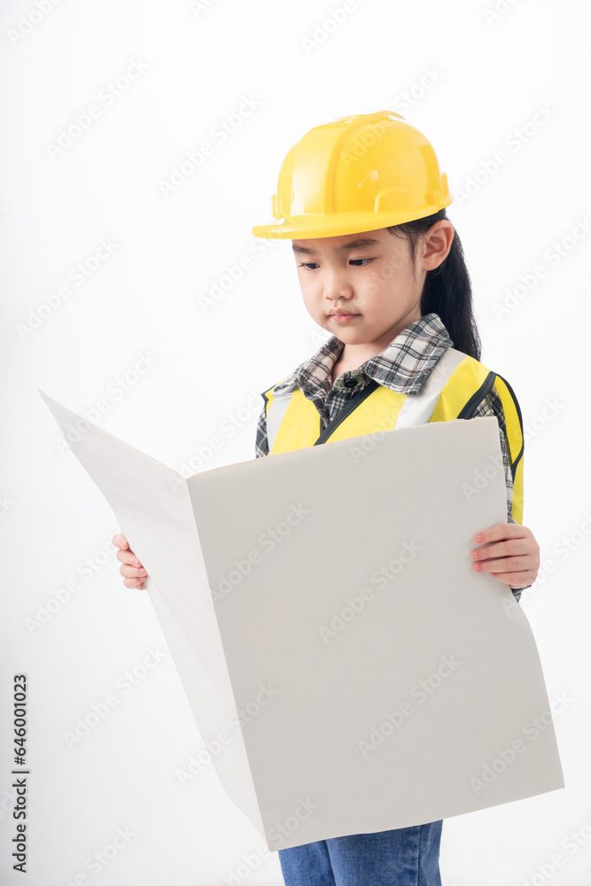 Happiness cute Asian girl wearing yellow Engineer suit on isolate white background Happiness cute Asian girl wearing yellow Engineer suit on isolate white background