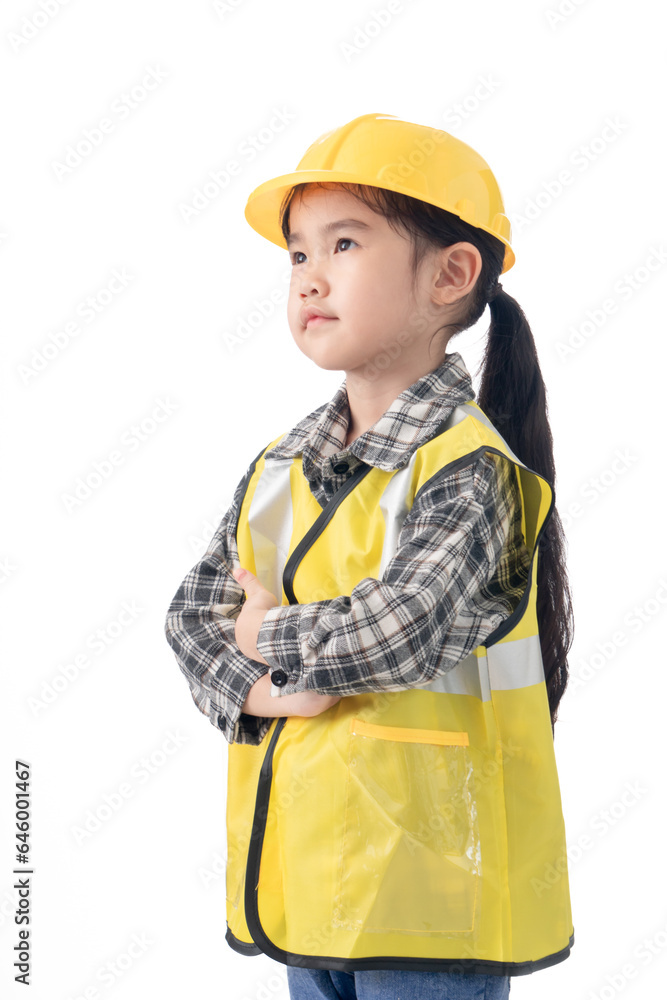 Happiness cute Asian girl wearing yellow Engineer suit on isolate white background Happiness cute Asian girl wearing yellow Engineer suit on isolate white background