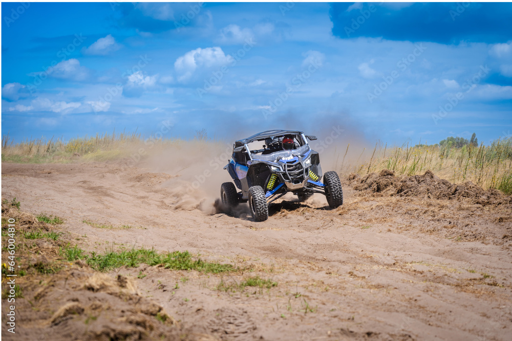 UTV in action offroad vehicle racing on sand dune. Extreme, adrenalin. 4x4. UTV in action offroad vehicle racing on sand dune. Extreme, adrenalin. 4x4.
