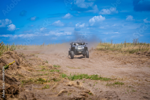 UTV buggy offroad vehicle racing on sand. Extreme, adrenalin. 4x4.