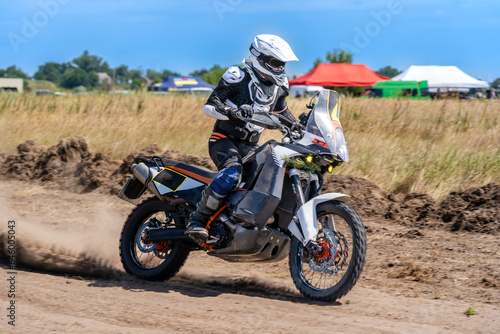 Fototapeta Naklejka Na Ścianę i Meble -  Motocross rider riding on extreme dust track