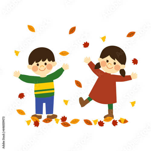 落ち葉で遊ぶ子供達