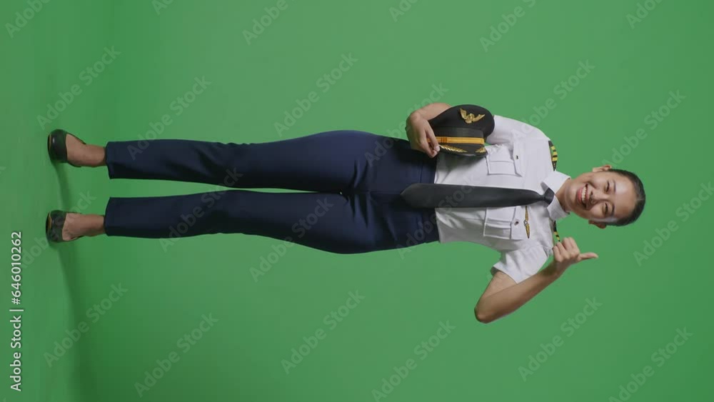 Full Body Of Asian Woman Pilot Smiling And Showing Thumbs Up Gesture To Camera While Standing In The Green Screen Background Studio
Full Body Of Asian Woman Pilot Smiling And Showing Thumbs Up Gesture To Camera While Standing In The Green Screen Background Studio