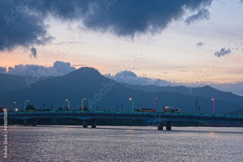 Panoramic view of the Preaek Tuek Chhu river at sunset in Kampot, Cambodia	
 photo