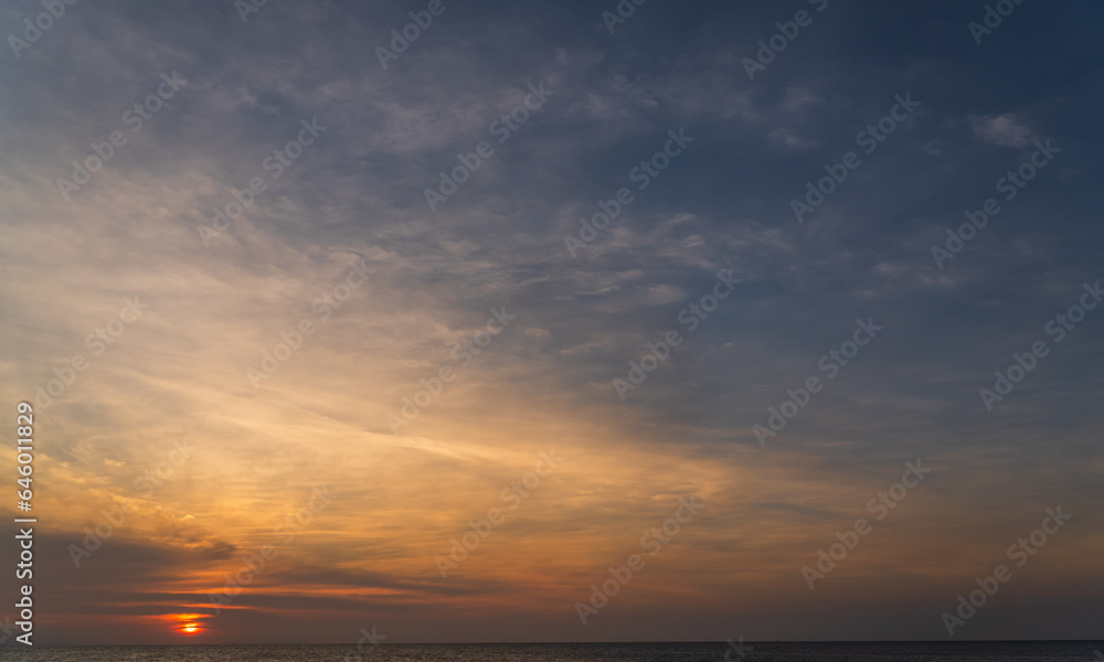 sunset sky over sea in the evening 