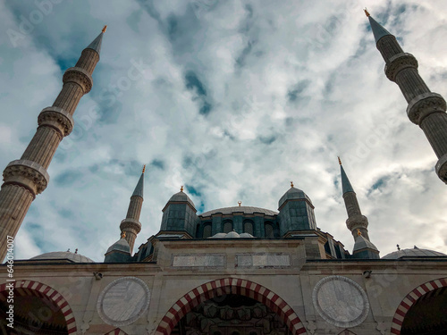 Rising into the blue cloudy sky, the Ottoman mosque offers a unique combination of landscape and historical architecture.