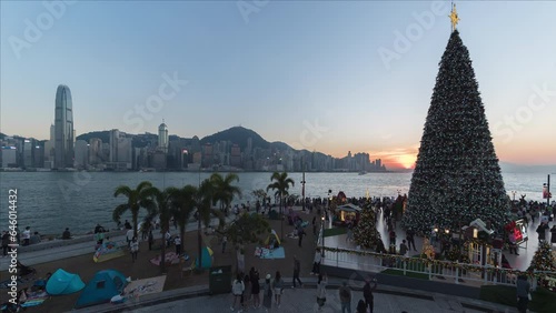 Time lapse of Christmas tree lighted up in Hong Kong city