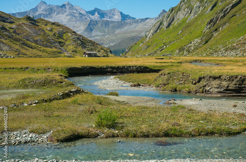 Aerial view of meanders of the river in Valle Aurina, Alto Adige, Italy photo