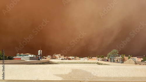 A sandstorm over marrakech, morocco, in summer photo