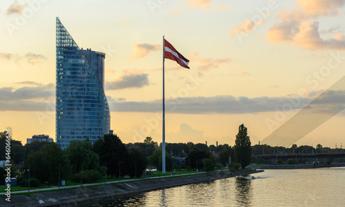 the largest flag of Latvia in Riga in summer at sunset, view across the Daugava river 1 photo