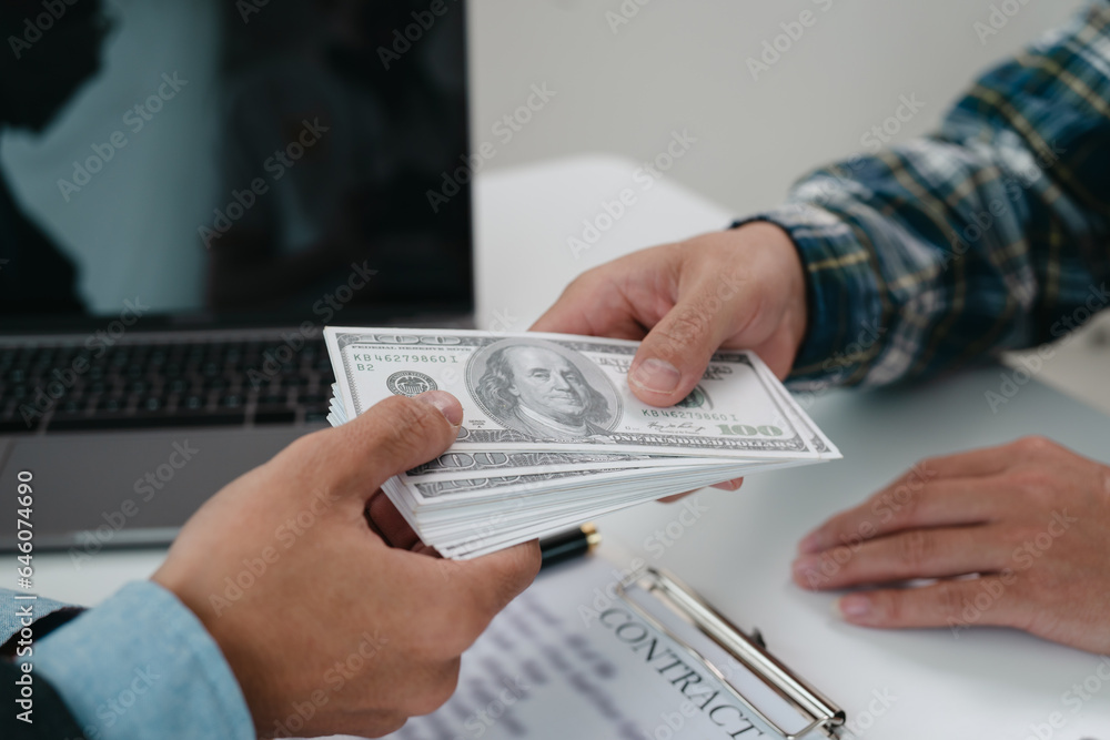 A real estate agent is talking with a client about buying a home or getting home insurance. Real estate agent buys, sells a house, agrees to buy a house. A real estate agent is talking with a client about buying a home or getting home insurance. Real estate agent buys, sells a house, agrees to buy a house.