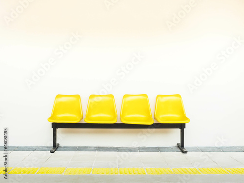 waiting chair yellow plastic