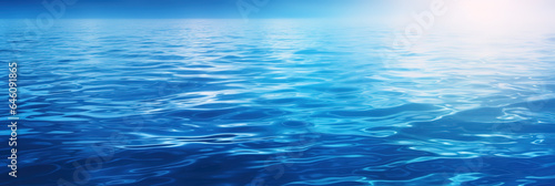 Blue water panorama background with soft waves
