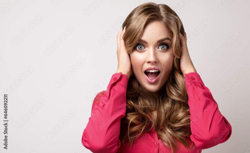 Woman surprise showing product .Beautiful girl pointing to the side . Presenting your product. Expressive facial expressions emotions businesswoman Woman surprise showing product .Beautiful girl pointing to the side . Presenting your product. Expressive facial expressions emotions businesswoman