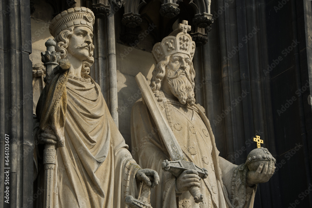 Two statues at the Cologne Cathedral - two kings with sword and imperial apple