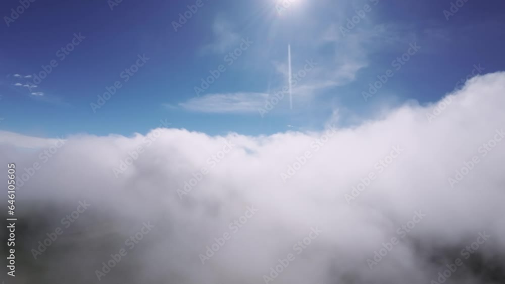 Real flight in the clouds first-person view from the cockpit. Cloud surfing in sunny weather. Aerial view flying through the clouds Real flight in the clouds first-person view from the cockpit. Cloud surfing in sunny weather. Aerial view flying through the clouds