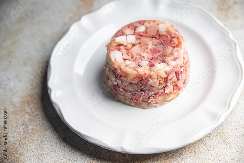 meat brawn food Sülze piece of meat in jelly pork, beef meat ready to eat meal food snack on the table copy space food background rustic top view photo
