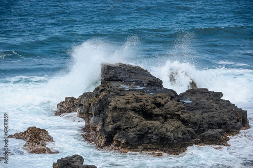 Waves breaking on Gris Gris Beach, Souillac, Mauritius photo