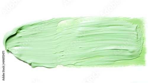 Isolated light green Brush Stroke on a white Background. Acrylic Paint Texture with Copy Space 