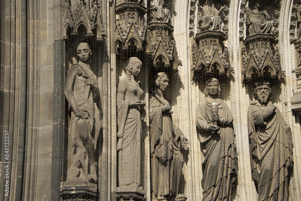 Statues at the left entrance portal of Cologne Cathedral