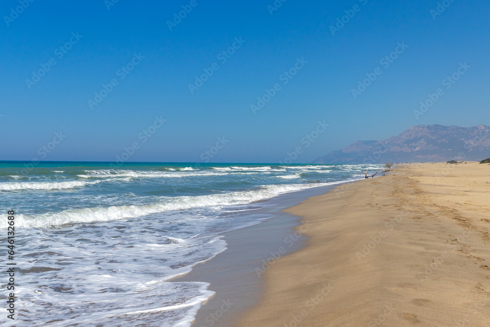 Antalya Patara beach, sea, sand and mountain view.