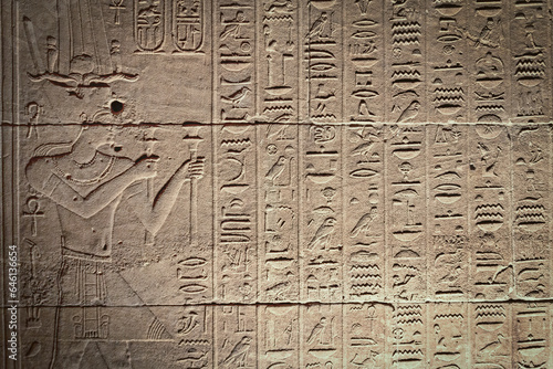 Old Egyptian hieroglyphs on an ancient background. Horizontally.  photo